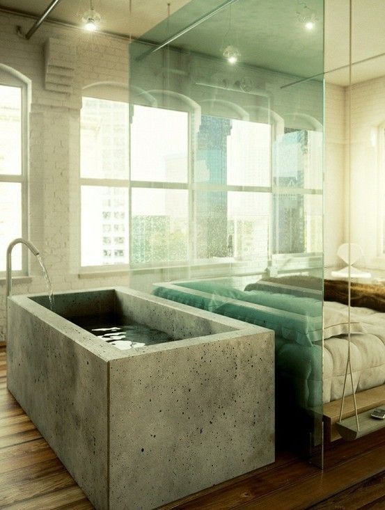 blend the master bedroom with the bathroom by bringing the tub into shared space